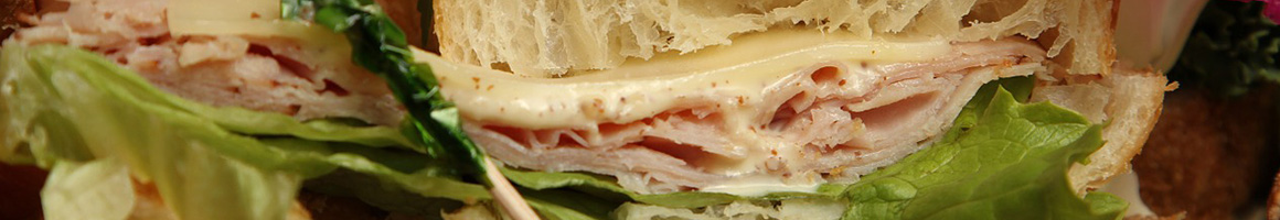Eating Sandwich at Daily Grind restaurant in Santa Barbara, CA.